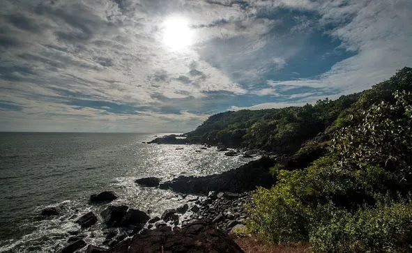 Secluded sands and turquoise cove at Half Moon Beach